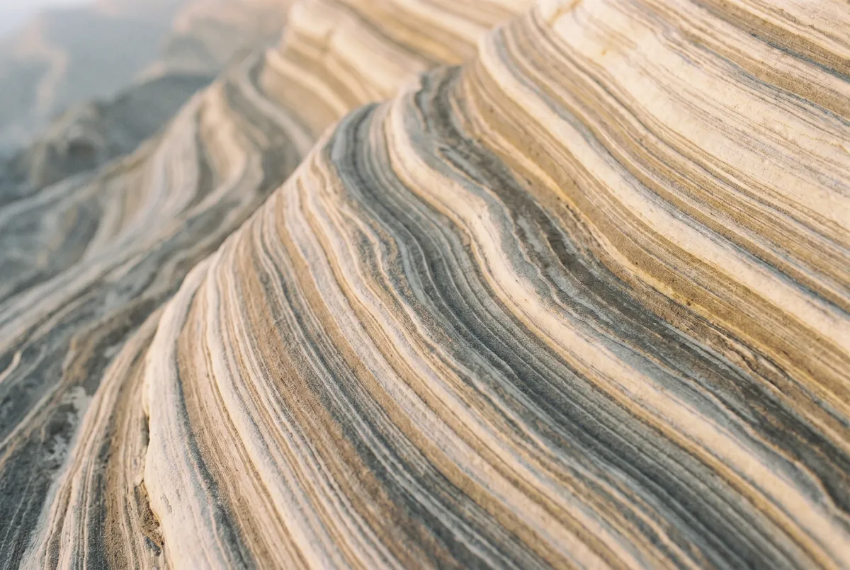 Folded bands of sedimentary rock